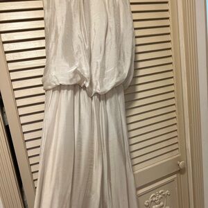 Women’s silk jumpsuit with elastic waist. Cream color M/L